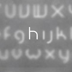 Настенный светильник Artemide Alphabet 1202h00A