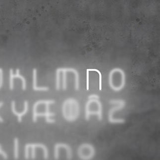 Настенный светильник Artemide Alphabet 1211N00A + supp