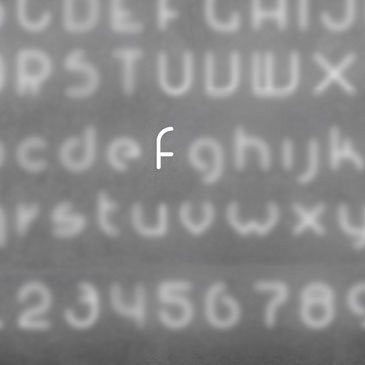Настенный светильник Artemide Alphabet 1202f00A